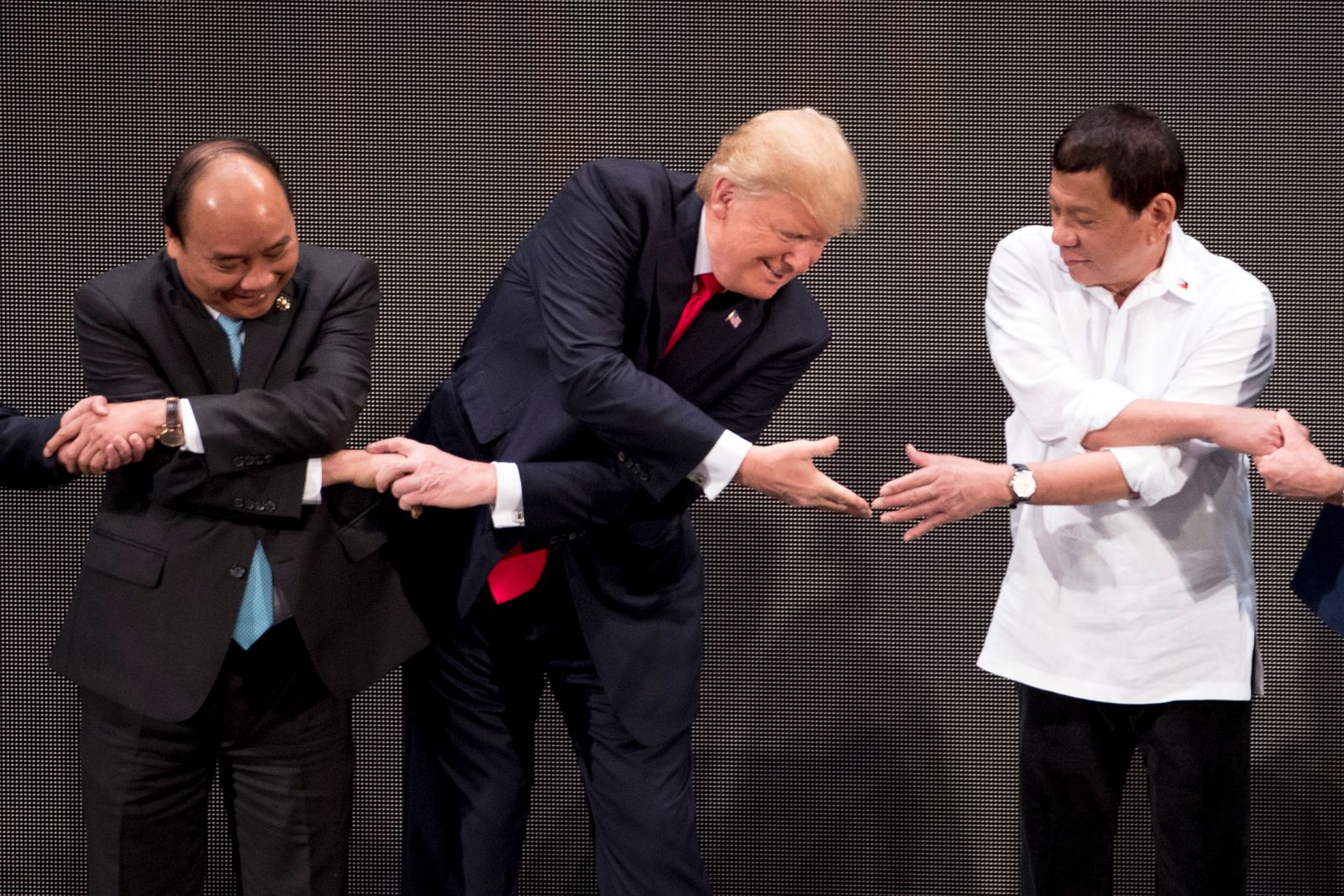 Trump asean shakehand.jpg